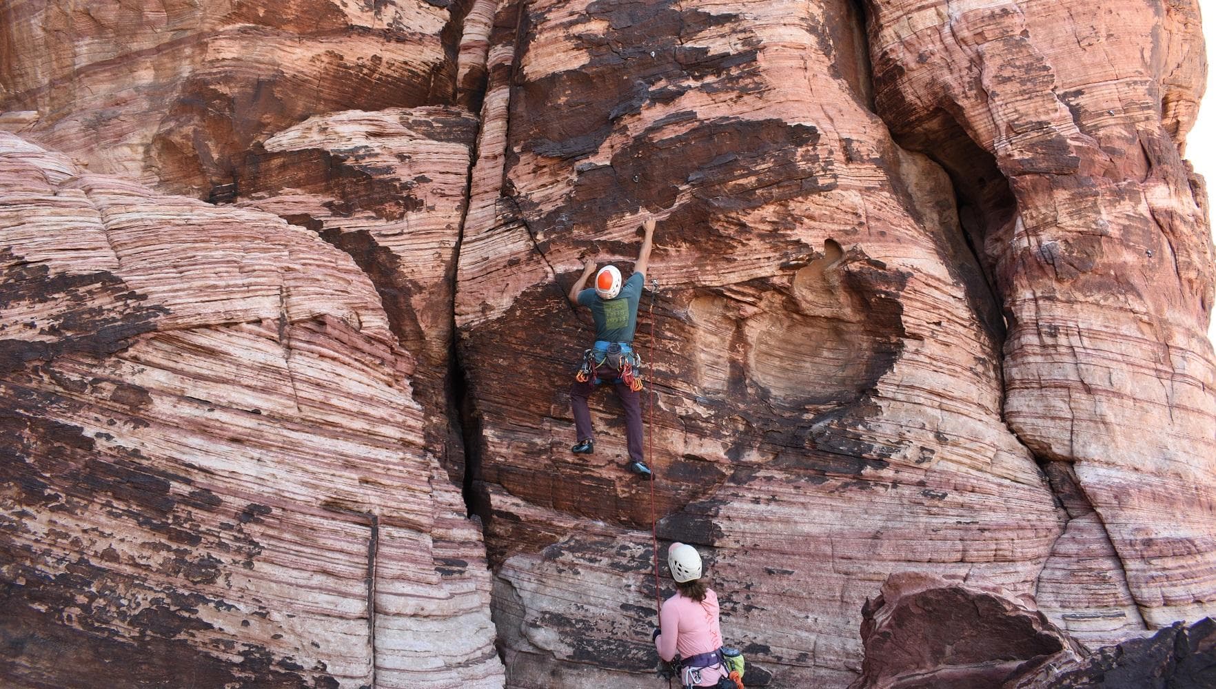 Lead climber starting up a route